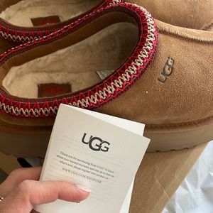 Women’s chestnut Tazz Ugg slippers.